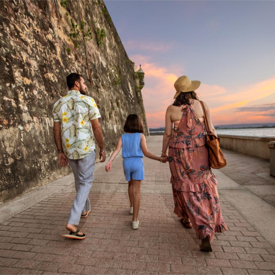 A family explores Paseo de la Princesa in San Juan, Puerto Rico