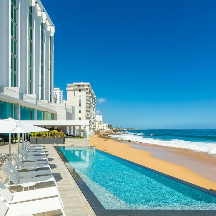 The sleek pool overlooks the ocean at Condado Ocean Club.