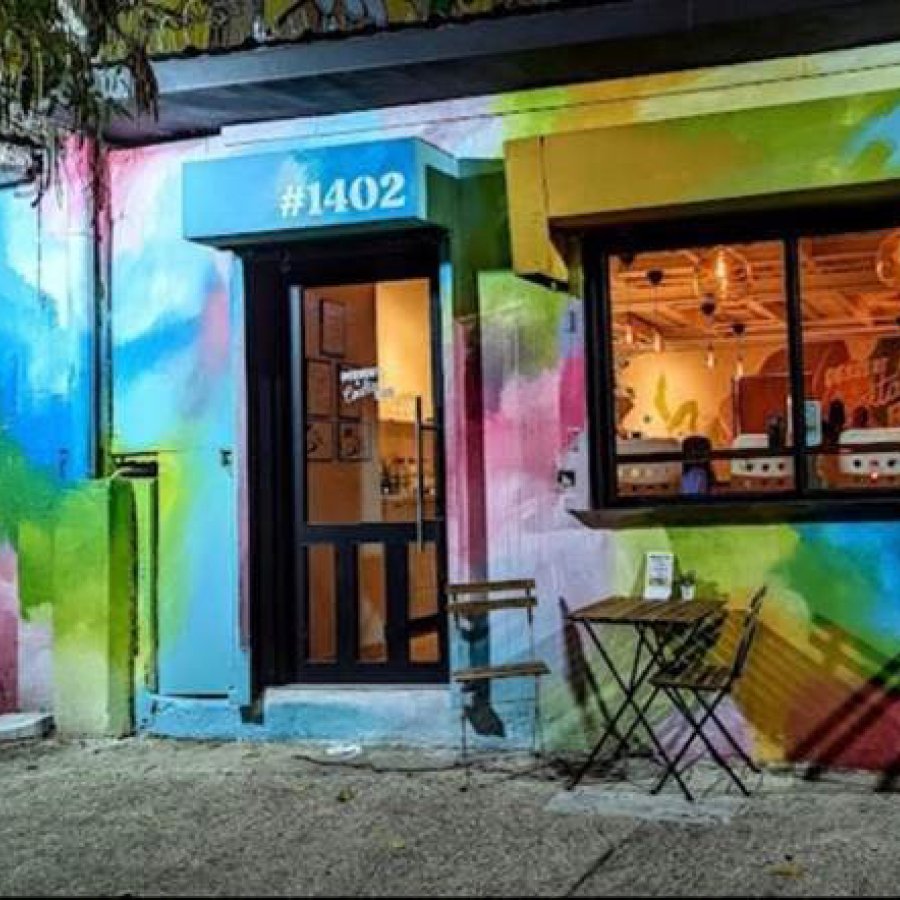 Exterior of VIDA by Yara chocolate shop in Santurce, San Juan, which is painted in a variety of bright colors.
