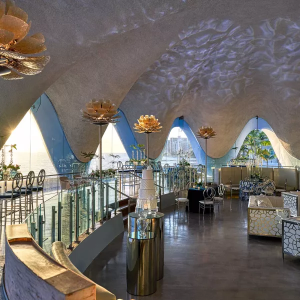 Interior of the iconic seashell-shaped venue at La Concha Renaissance Resort, a top choice for all inclusive wedding packages Puerto Rico.