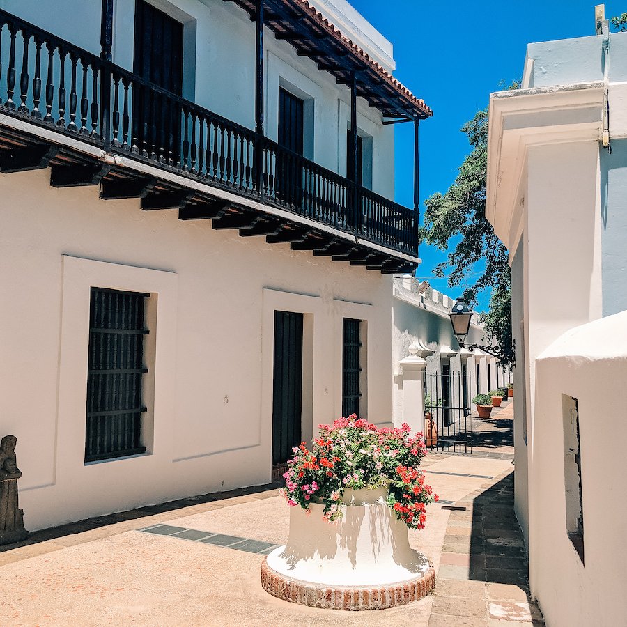 The courtyard surrounding the Museo de Casa Blanca, the former home of Juan Ponce de León, on a beautiful day in San Juan, PR.