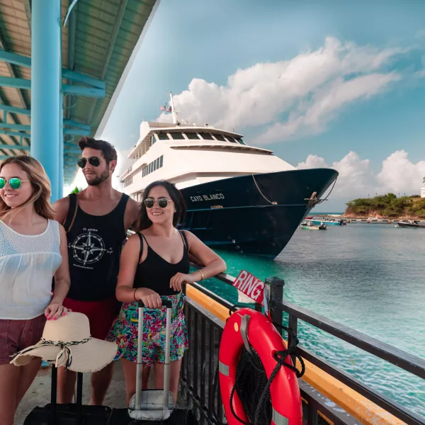 Three young people at the ferry from San Juan to Vieques & Culebra.