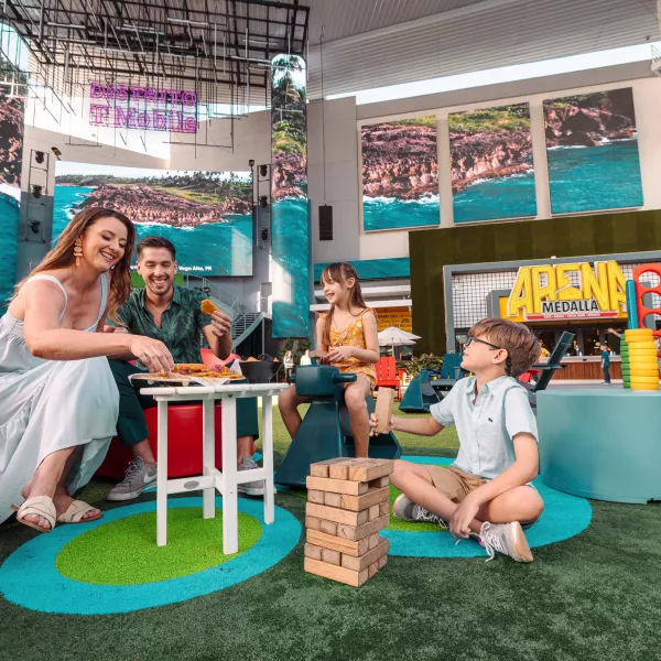 A family plays a board game together. 
