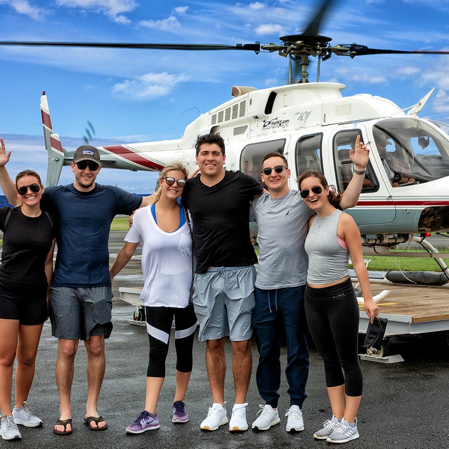 Six young adults just before getting aboard a helicopter to tour Old San Juan.