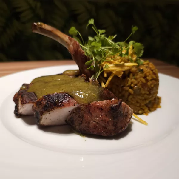 Lamb chops and rice at Areyto Modern Cuisine – A signature dish at this standout San Juan restaurant.