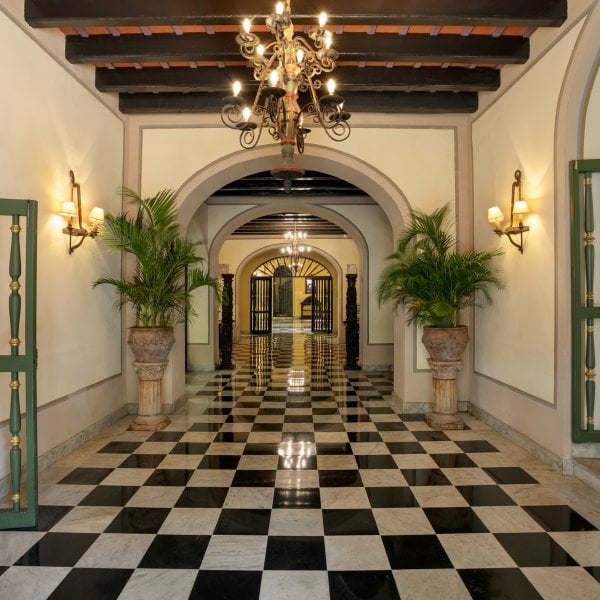 Historic charm meets timeless elegance in El Convento Hotel’s lobby.