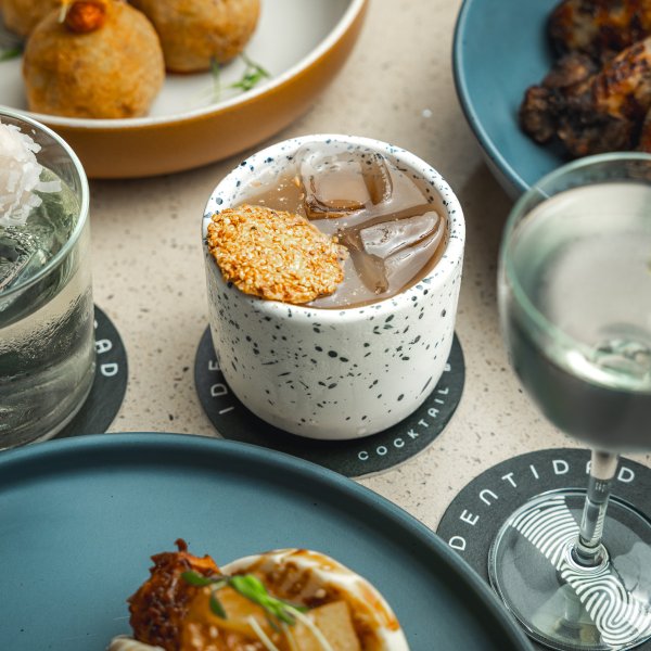 Cocktails and food flat lay from Identidad.