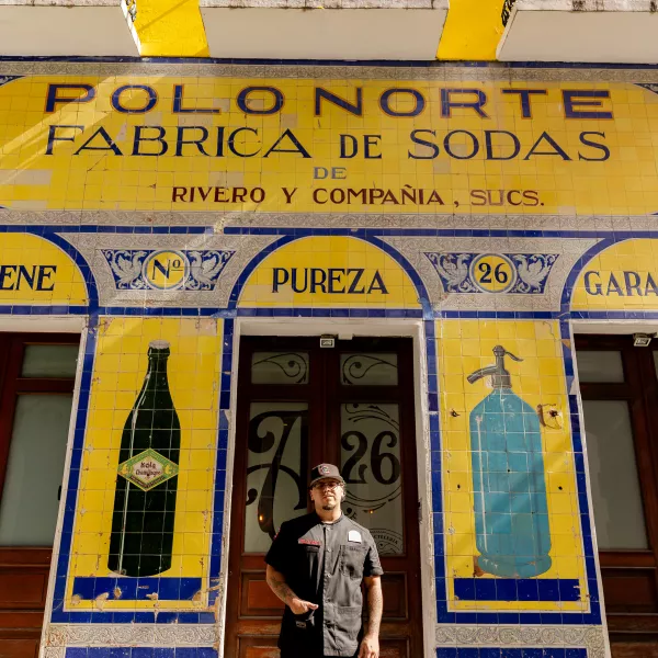 Giovanni Budet standing in front of Antiguo 28.