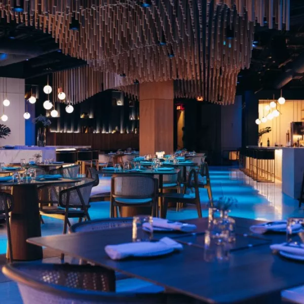 Elegant interior of Lala, a contemporary restaurant in San Juan, featuring sophisticated design, ambient lighting, and beautifully set tables for an upscale dining experience.