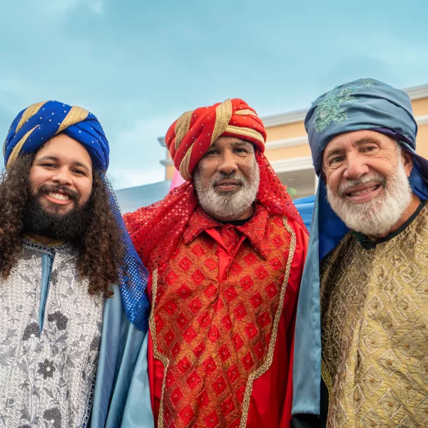 Three men dressed as the Three Wise Men smile during the Fiesta de los Reyes Magos celebration in Puerto Rico.