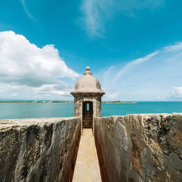 A historic garita overlooks the Atlantic Ocean from the walls of El Morro in Old San Juan, Puerto Rico.
