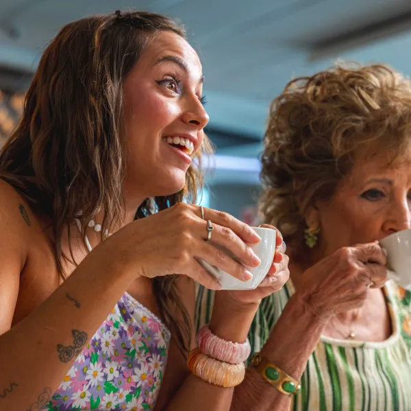 Sabor del Pueblo hosts sip cups of freshly brewed Puerto Rican coffee during their visit to Lares.