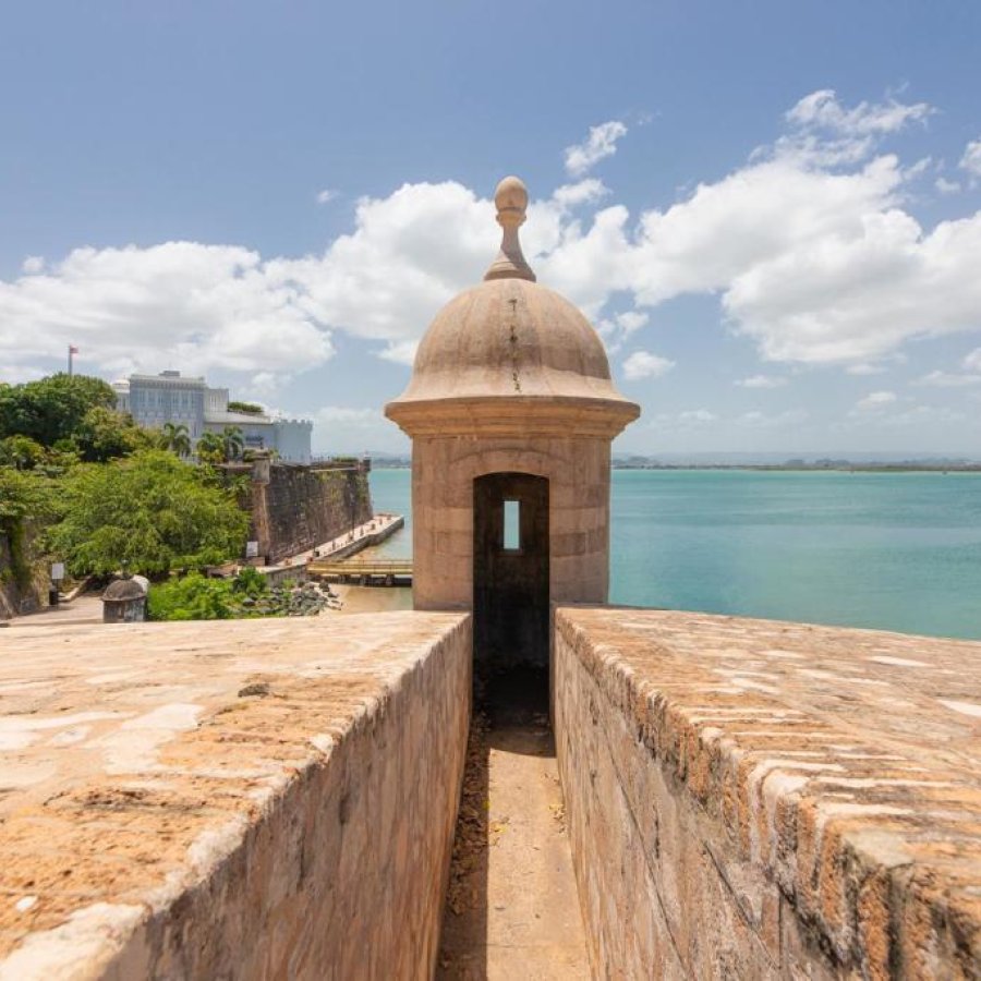 A garita, or sentry box, on a fort in Old San Juan, with the ocean in the background.