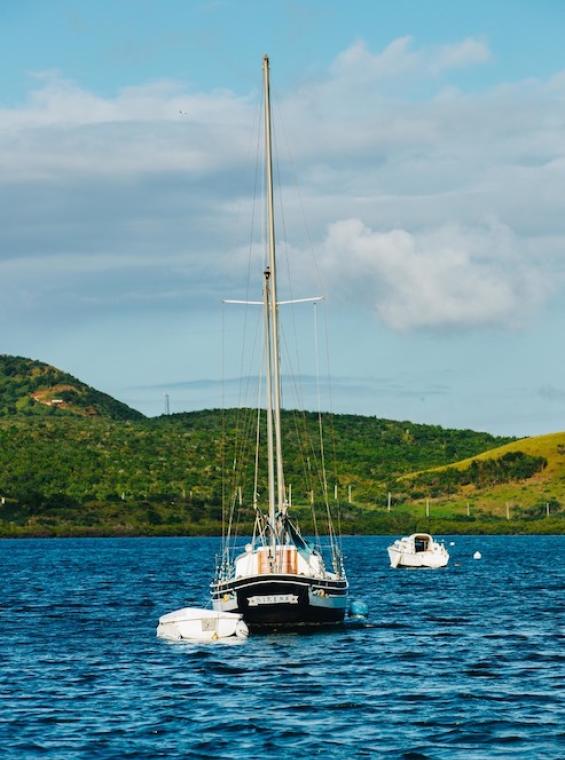 A boat sits off the coast in Culebra.