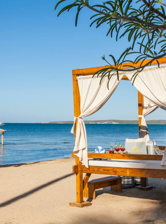 Relaxing beachside bed at the Copamarina Beach Resort.
