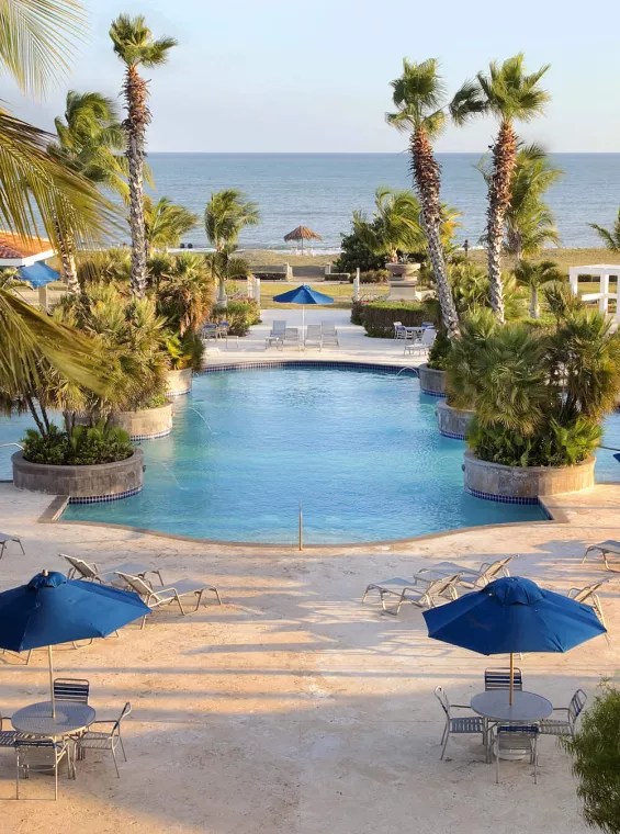 Relaxing poolside at the Hilton Ponce Golf & Casino Resort. 