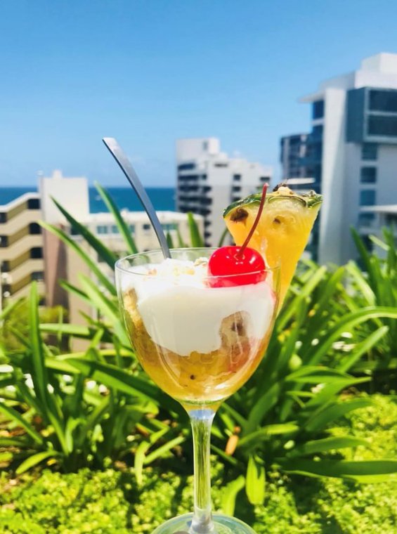 A dessert inspired in piña colada is served at the AC Rooftop