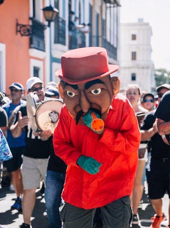 People in costume parading on the streets