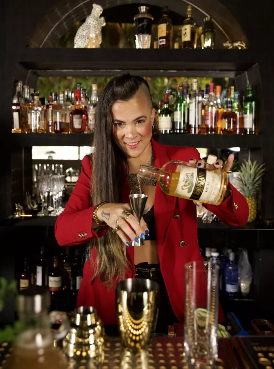 Nicky Fas serving Crab Island Rum