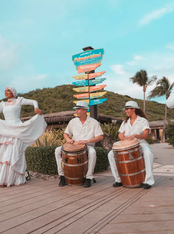 Puerto Rican dances often feature coordinated outfits and lots of colors.