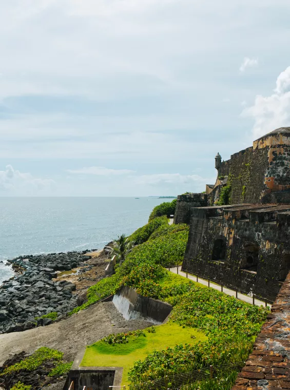 View of Castillo San Felipe del Morro in Old San Juan, a Spanish colonial fort overlooking the Atlantic Ocean and one of Puerto Rico's most important historic landmarks.
